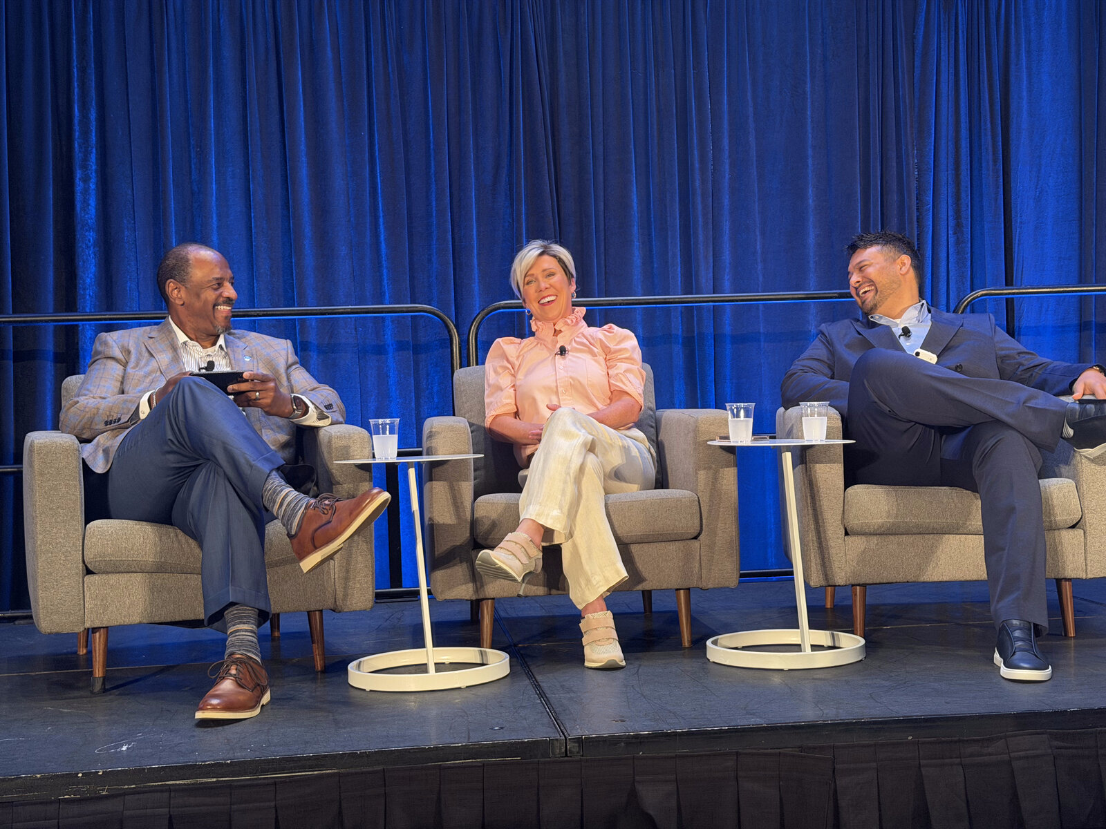 Chris Courneen in a panel discussion with fellow executive speakers